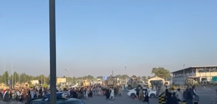 Afghans scramble to the Kabul airport to fly out of the country as the Taliban encircled the capital August 16, 2021.