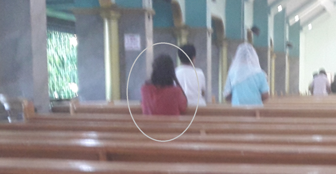 Poor Woman Praying Inside Church